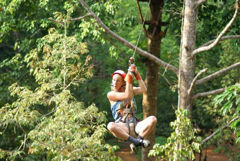 Krabi: Ziplining with Abseiling and Rock Climbing Options - Abseiling down a limestone cliff