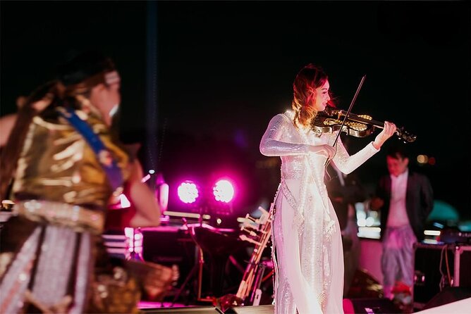 Luxury Dinner Cruise with Guide and Transfer (Opt. Executive Van) - Candlelit dining, seafood, and live music