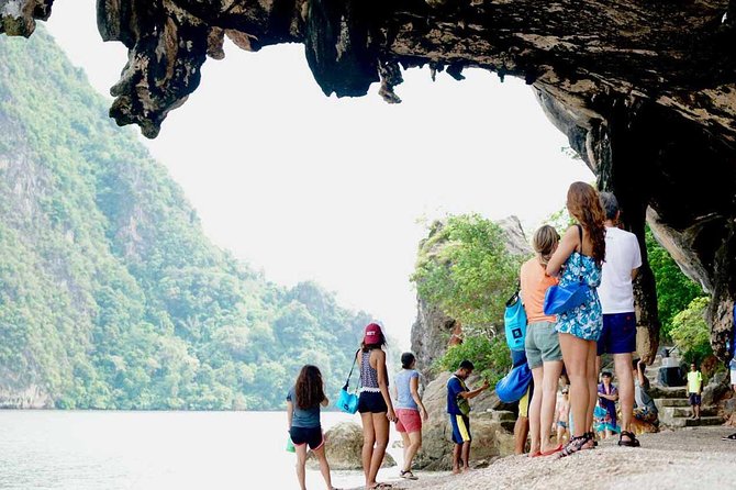 Luxury Small Group Phang Nga Bay and Beyond - Swimming through a narrow cave at Kudu Island