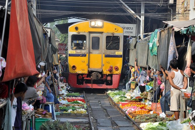 Maeklong & Damnoen Saduak Markets: Railway & Floating Market Tour - Shopping, bargaining, and the tourist factor