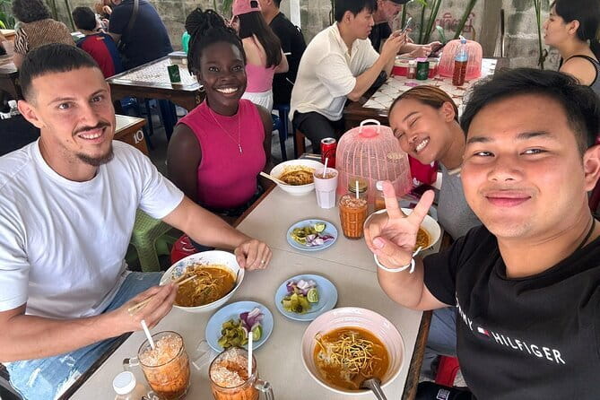 Old Town Chiang Mai Food Tour with 10+ Local Dishes Tastings - Street food along Intrawarorot Road