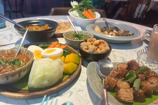 Old Town Chiang Mai Food Tour with 10+ Local Dishes Tastings - The vocational center and Thai tea stop
