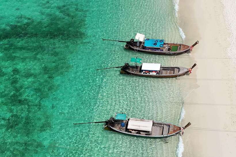 Phi Phi: 7 Islands longtail boat with Sunset and Plankton - Monkey Beach and Viking Cave