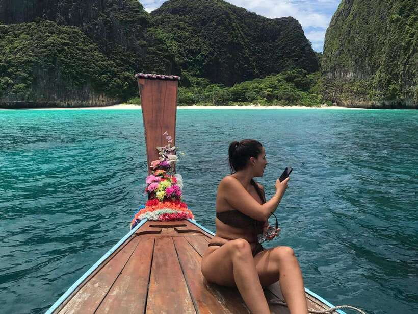 Phi Phi: 7 Islands longtail boat with Sunset and Plankton - Nui Bay and the camel rock