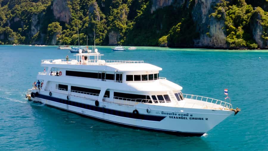 Phi Phi Island Highlights: Cruise, Snorkel & Buffet Lunch - Snorkeling and Swimming in Clear Water