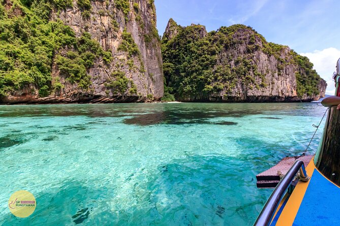 Phi Phi One Day Tour by Speed Boat from Ao Nang, Krabi - Pileh Bay, turquoise water inside limestone walls