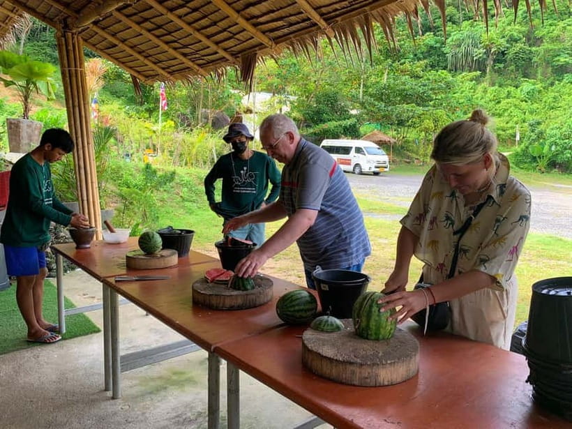 Phuket City Tour with Night Market Visit & Elephant Feeding - Wat Chalong in a focused 30 minutes
