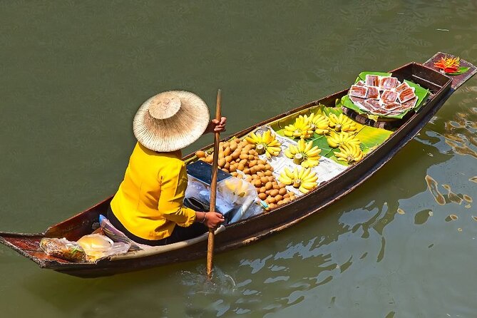 Private Damnoen Saduak Floating Market and Train Market Tour - Watching the market fold around the train