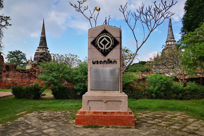 Private Excursion to Ayutthaya, UNESCO World Heritage site with Boat Tour - Wat Mahathat and the Buddha image in tree roots