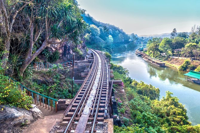 Private Tour: Thai–Burma Death Railway Bridge on the River Kwai from Bangkok - Approaching the bridge by long-tail boat