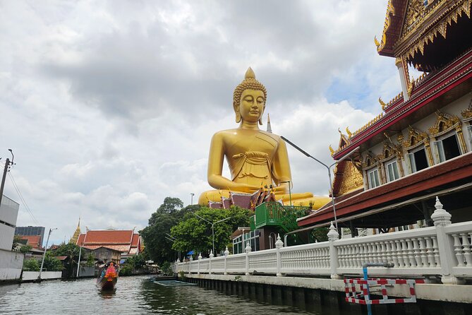 Private tour to Wat Pho,Wat Arun, Canal Tour,Flower Market - Wat Arun and its porcelain-covered spire
