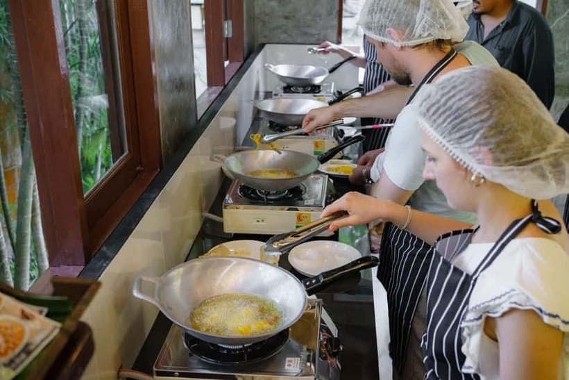 Railay: Hands-On Thai Cooking Class at Railay Beach - Chopping, slicing, and cooking your own food