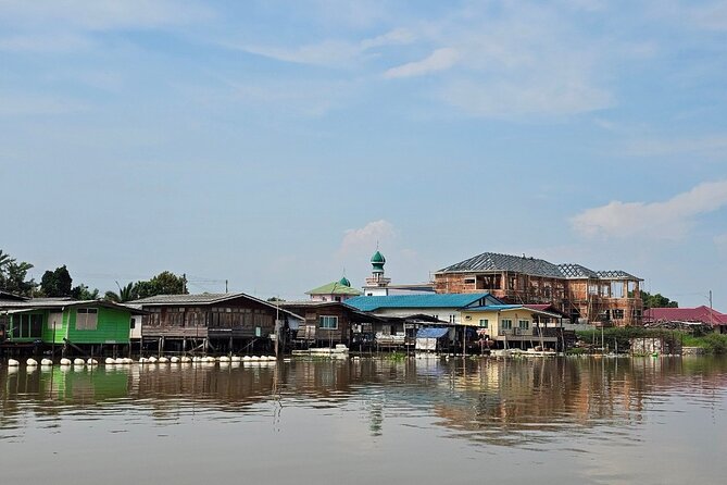 Unique and Scenic Slow Boat Tour from Bangkok to Ayutthaya - From City Buildings to Riverside Villages