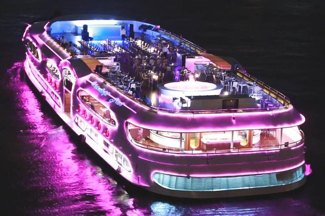 Wonderful Pearl: Bangkok's Dinner Night Cruise - The Grand Palace and Wat Phra Kaew appear in the distance